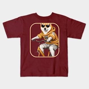 Shiba Inu wearing a hoodie riding a bike and wearing sunglasses Kids T-Shirt